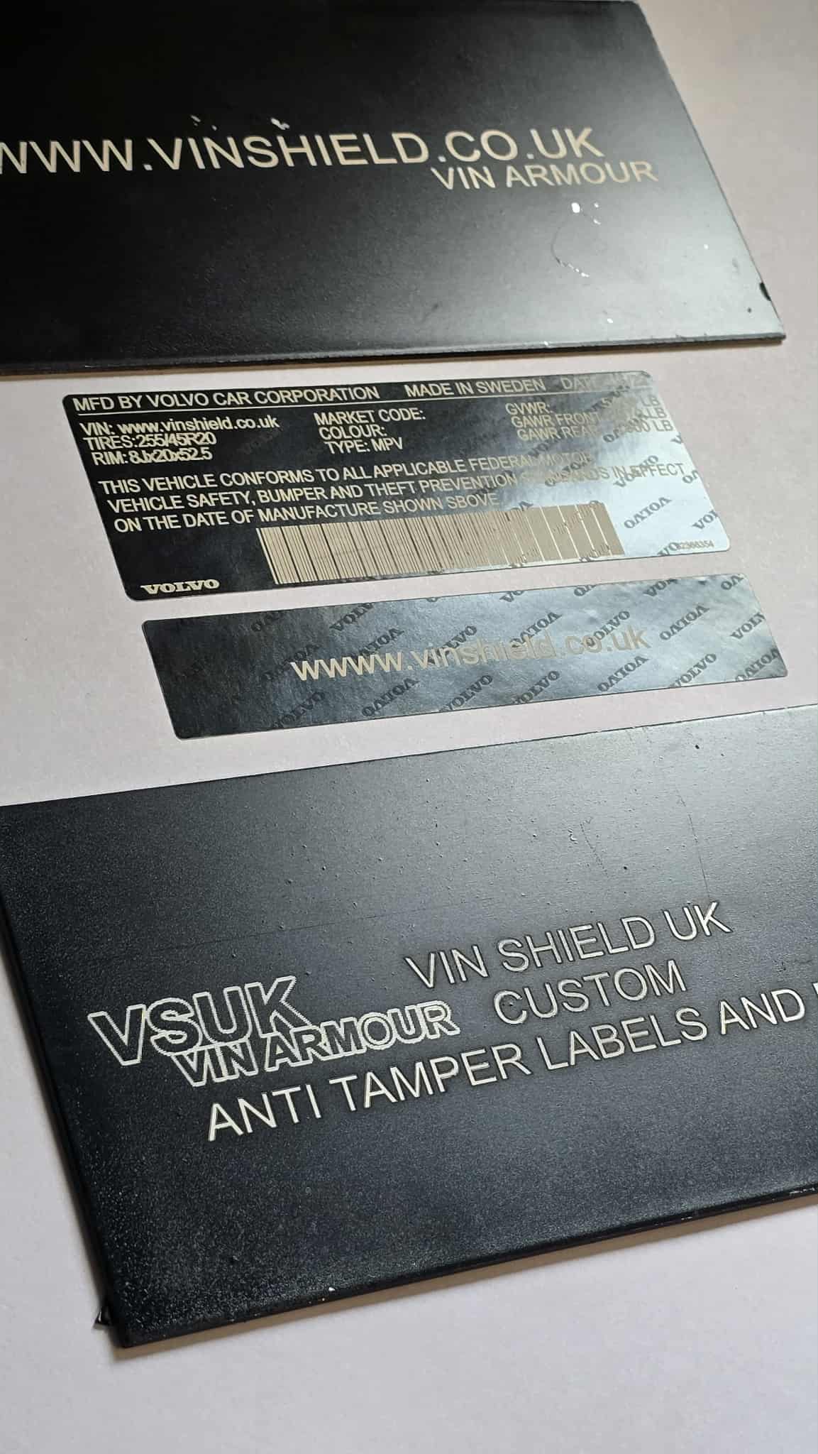 VSUK vin stickers vin plates chassis plates vin tags data plates anti tamper vin labels displayed on black background