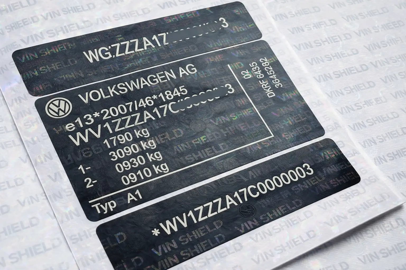 Black volkswagen ag vehicle identification label with white text and a silver logo, featuring vin numbers and weight specifications.