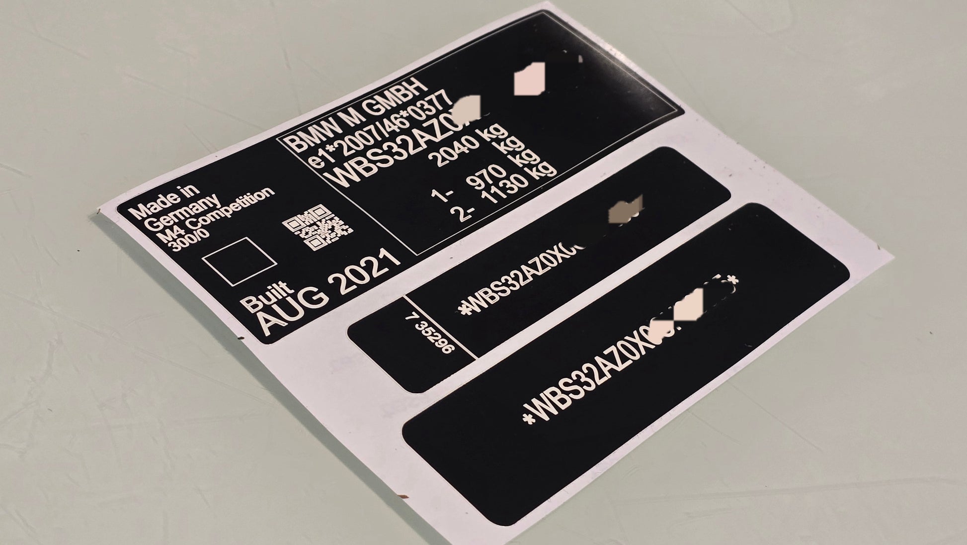 BMW M5 competition replacement VIN sticker set with vehicle details and compliance markings