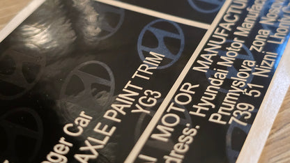 Hyundai Ioniq VIN label replacement UK close-up showing paint trim and motor manufacturer details by VINSHIELD UK