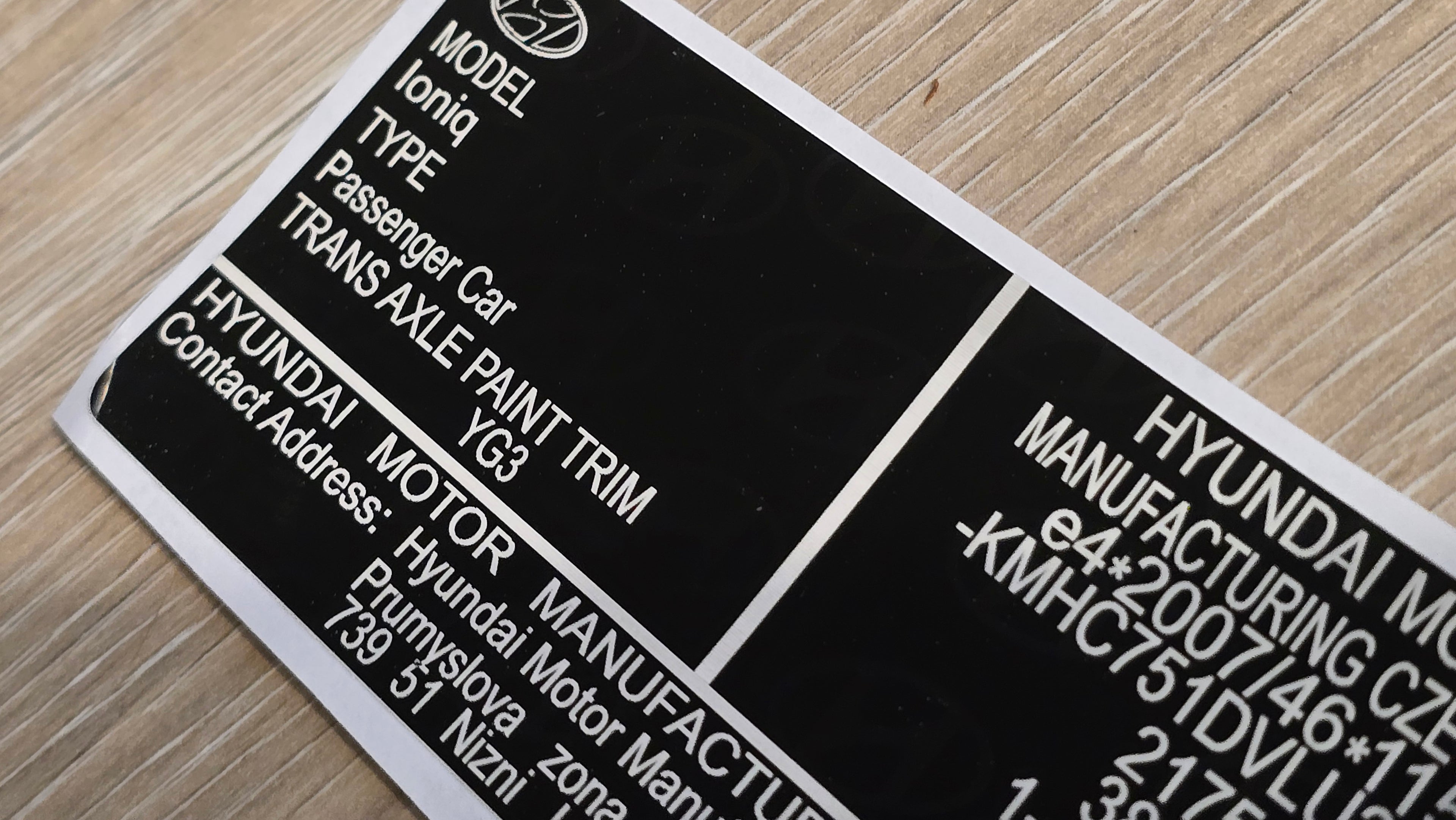 Hyundai Ioniq VIN label replacement UK showing black and white vehicle identification details