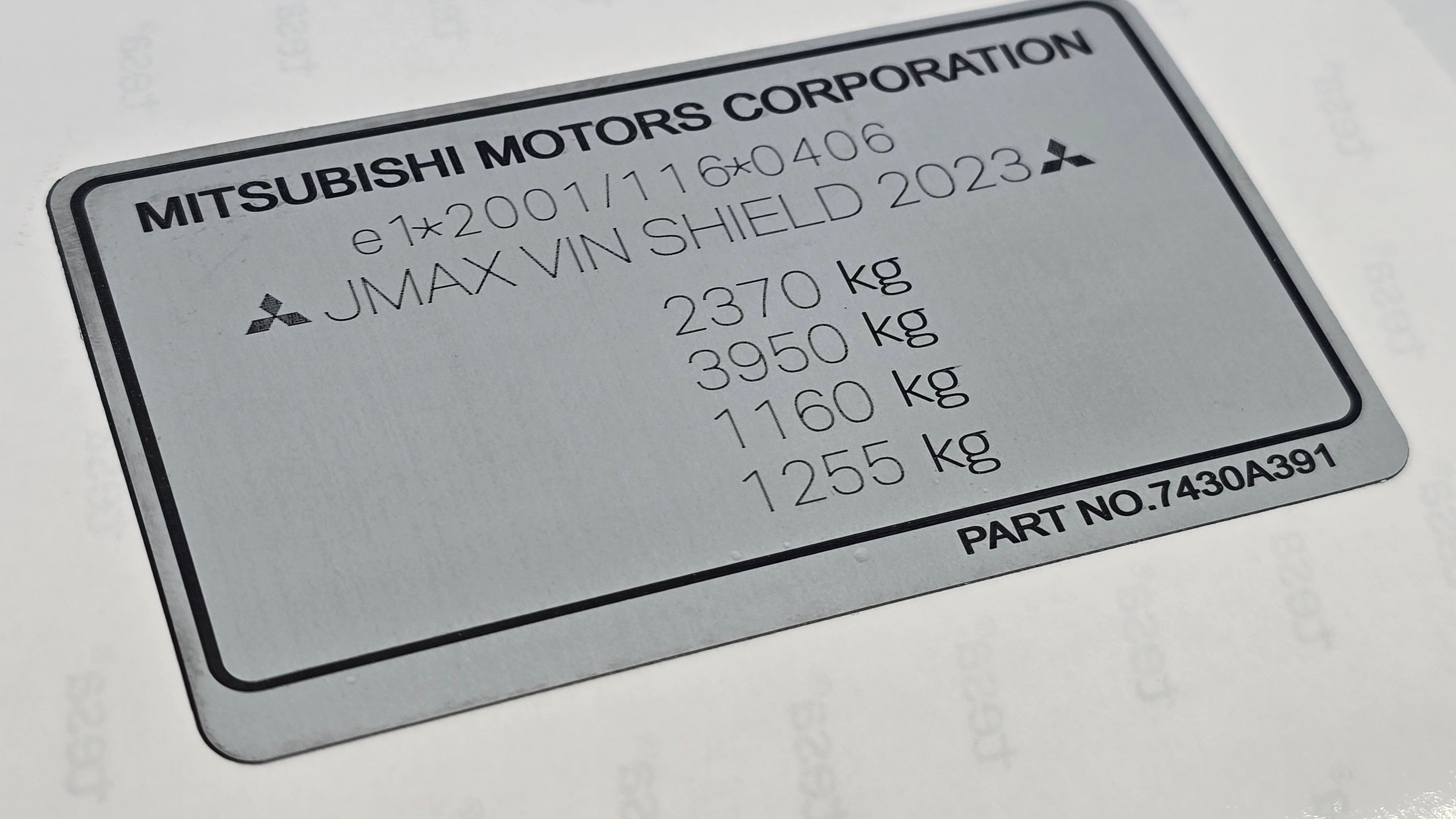 Mitsubishi VIN door label replacement with vehicle weight specifications and part number 7430A391
