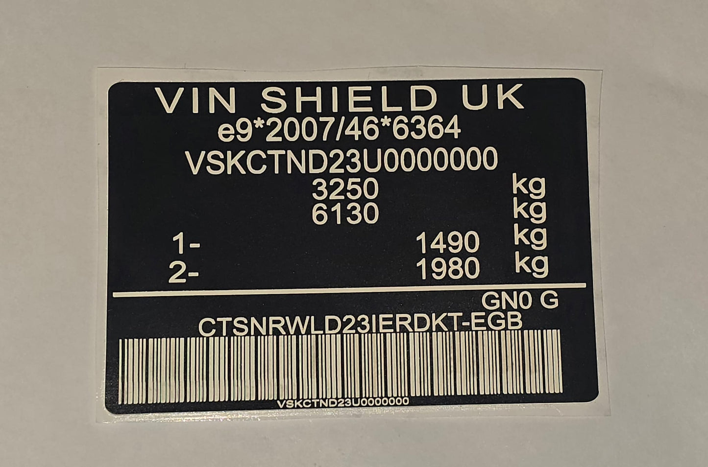 VINSHIELD UK black data plate with vehicle identification details and barcode for vin stickers vin plates chassis plates vin tags data tags data plates
