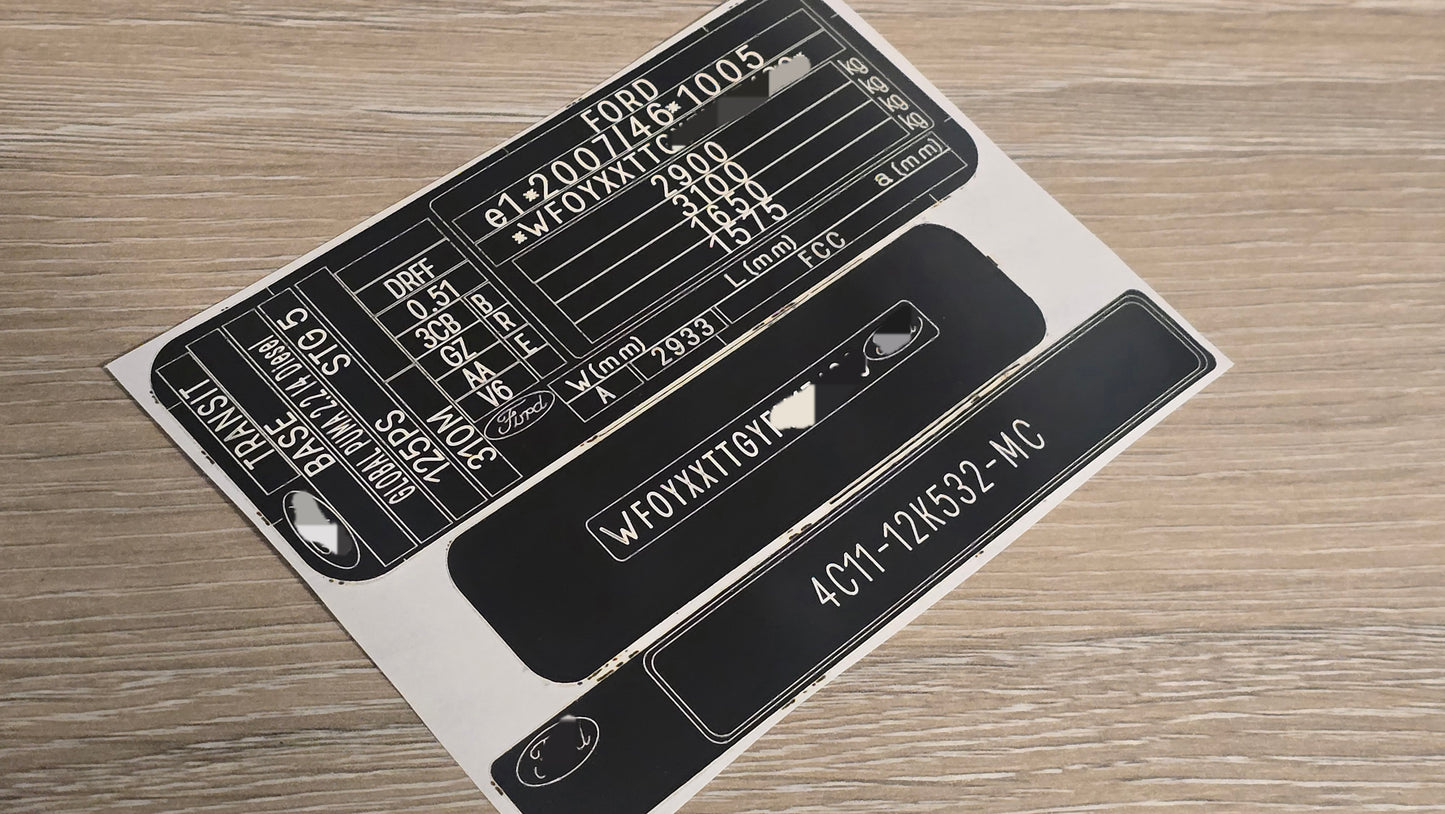 VINSHIELD UK black and white vin stickers chassis plates vin tags data plates anti tamper vin labels on wood surface